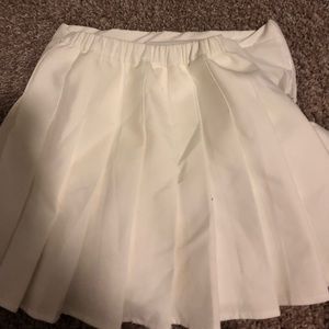 white pleated skirt